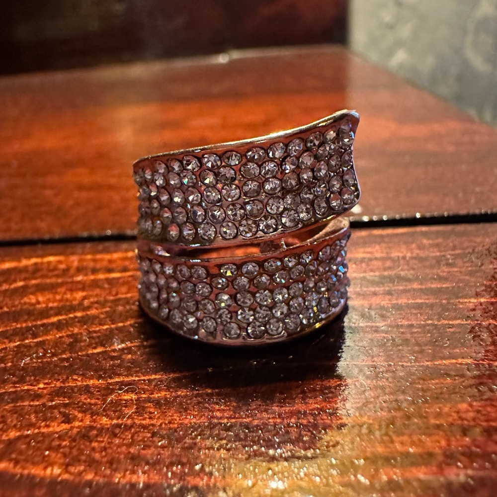 Ring about a size 6.  Rhinestone maybe silver or gold plated. Vintage